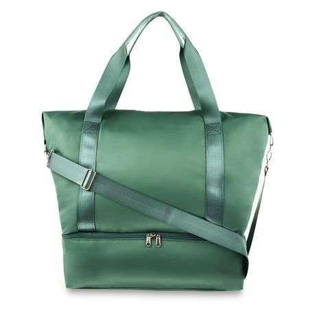 a green handbag on a white background with the strap down to it's shoulder