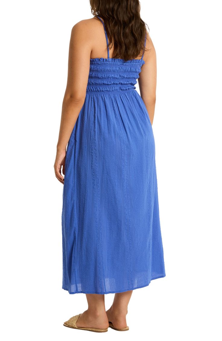 This strapless cover-up dress is crafted of from cotton and designed with a smocked bodice that leads to a flowy skirt. 44" center front length (size Medium) Slips on over head Strapless Smocked bodice 100% cotton Hand wash, dry flat Imported Bandeau Tube Top With Smocked Back For Beach, Casual Smocked Back Tube Top For Beach, Casual Beach Tube Top With Smocked Back, Strapless Beach Tube Top With Smocked Back, Strapless Tube Top With Smocked Back For Beach, Spring Vacation Ruched Tube Top, Ruched Tube Top For Beach In Spring, Sleeveless Tube Top With Smocked Back For Vacation, Casual Ruched Tube Top For Beach