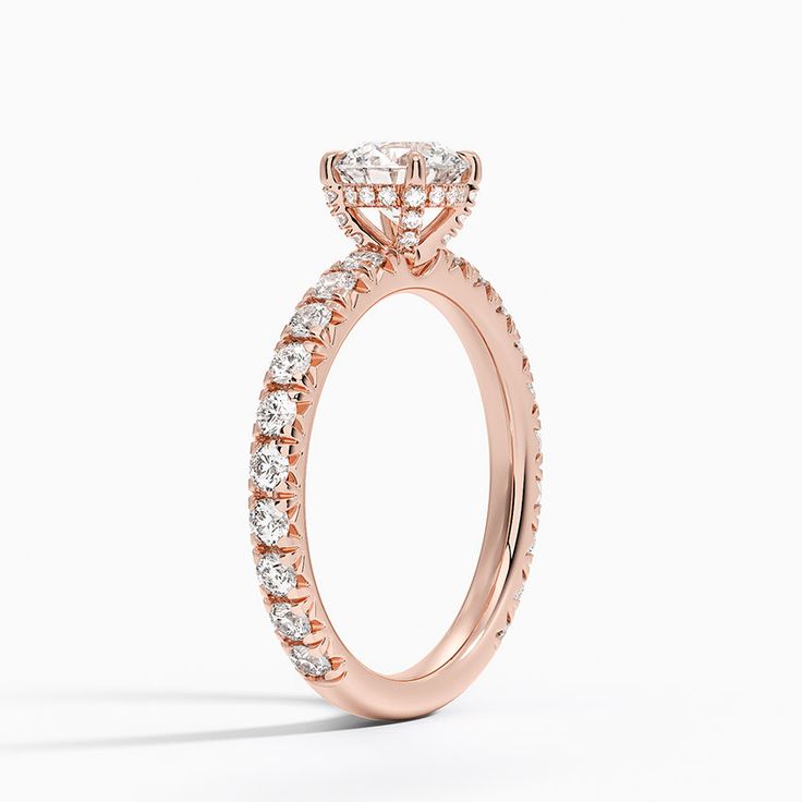 Olympia Diamond Engagement Ring - 14K Rose Gold. This classic engagement ring features sparkling diamond accents that extend three-fourths of the way around the ring. A diamond adorned gallery and graceful claw prongs embrace the center gem (5/8 total carat weight). Classic Engagement Ring, Lab Diamond Engagement Ring, Classic Engagement, Rose Gold Diamond Ring, Claw Prong, Sparkling Diamond, Classic Engagement Rings, Brilliant Earth, Sparkle Diamonds