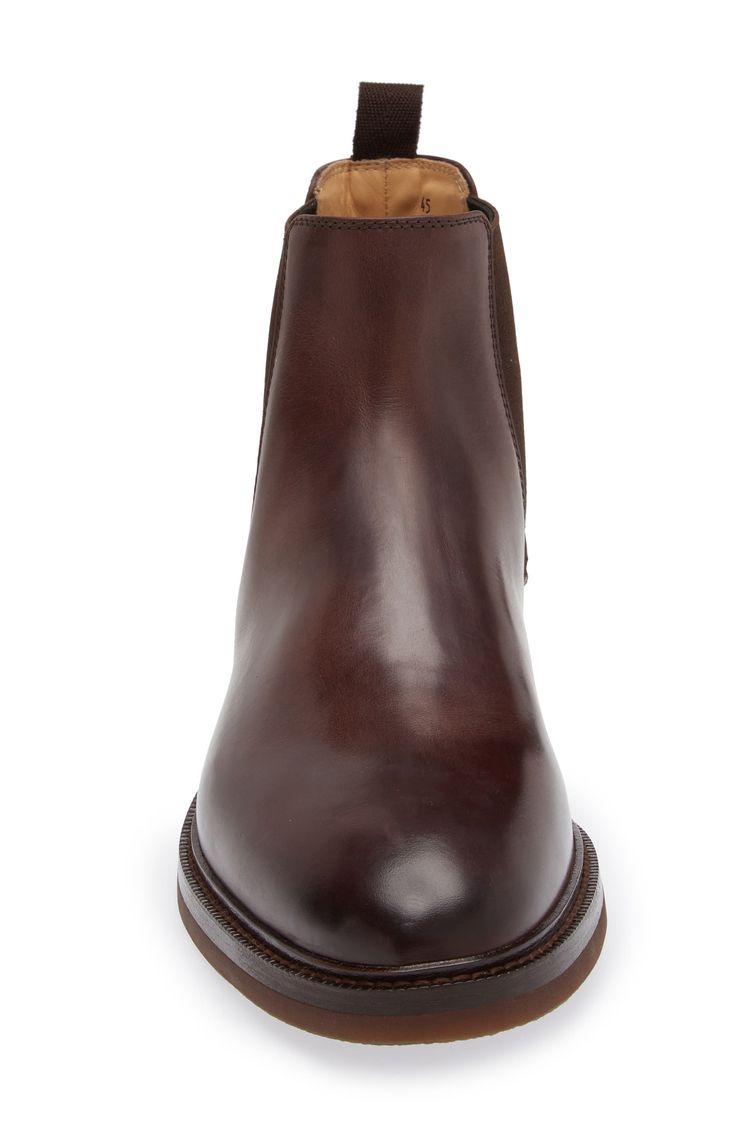 The label's impeccable Italian craftsmanship shines in the rich leather and streamlined silhouette of a timeless Chelsea boot grounded with a flexible sole. Pull-on style with elastic gore insets Leather and textile upper and lining/synthetic sole Made in Italy Designer Shoes Slip-on Calf Leather Boots With Rubber Heel Cap, Business Chelsea Boots With Suede Lining In Calf Leather, Calf Leather Chelsea Boots With Rubber Sole, Leather Sole Chelsea Ankle Boots For Business, Business Chelsea Ankle Boots With Leather Sole, Fitted Leather Chelsea Boots With Almond Toe, Brown Chelsea Boots With Suede Lining For Formal Occasions, Fitted Brown Chelsea Boots In Calf Leather, Elegant Chelsea Boots With Leather Footbed For Business