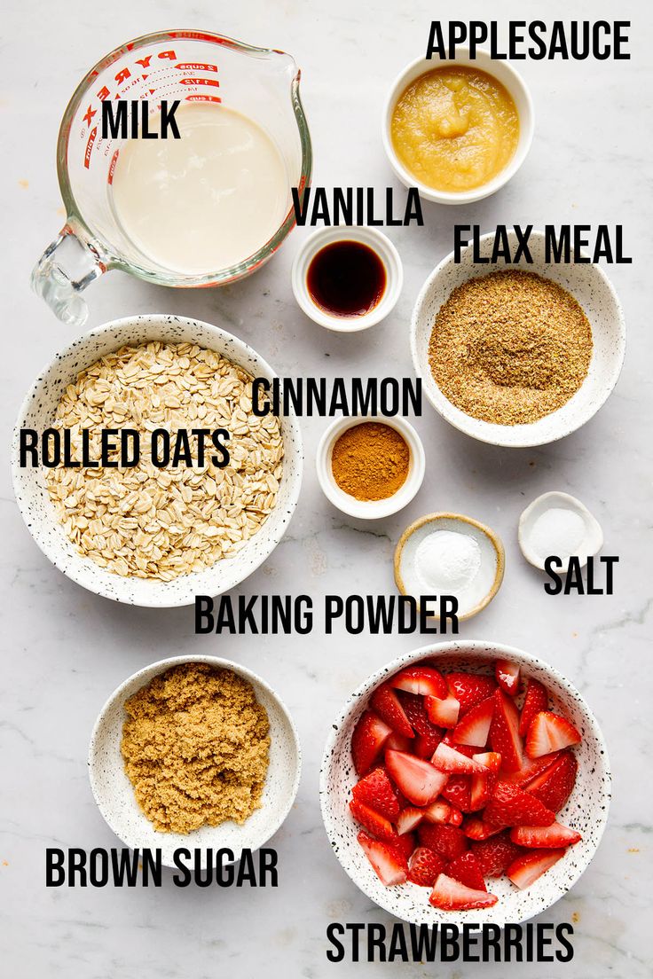 ingredients to make strawberry oatmeal smoothie laid out in bowls