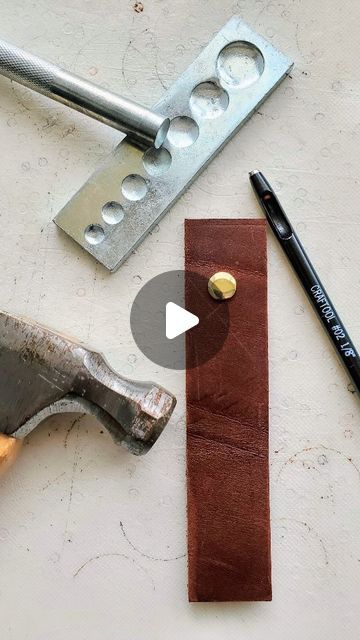 the tools are laying out on the table to be used for making leather jewelry bracelets