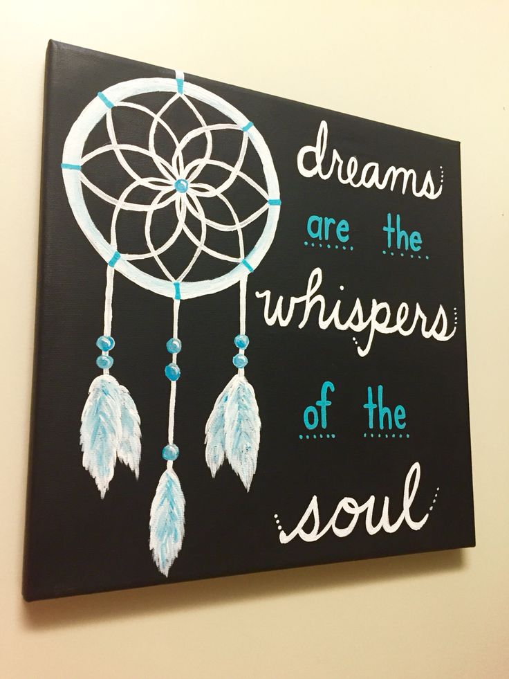 there is a painting on the wall that says dreams are the whispers of the soul