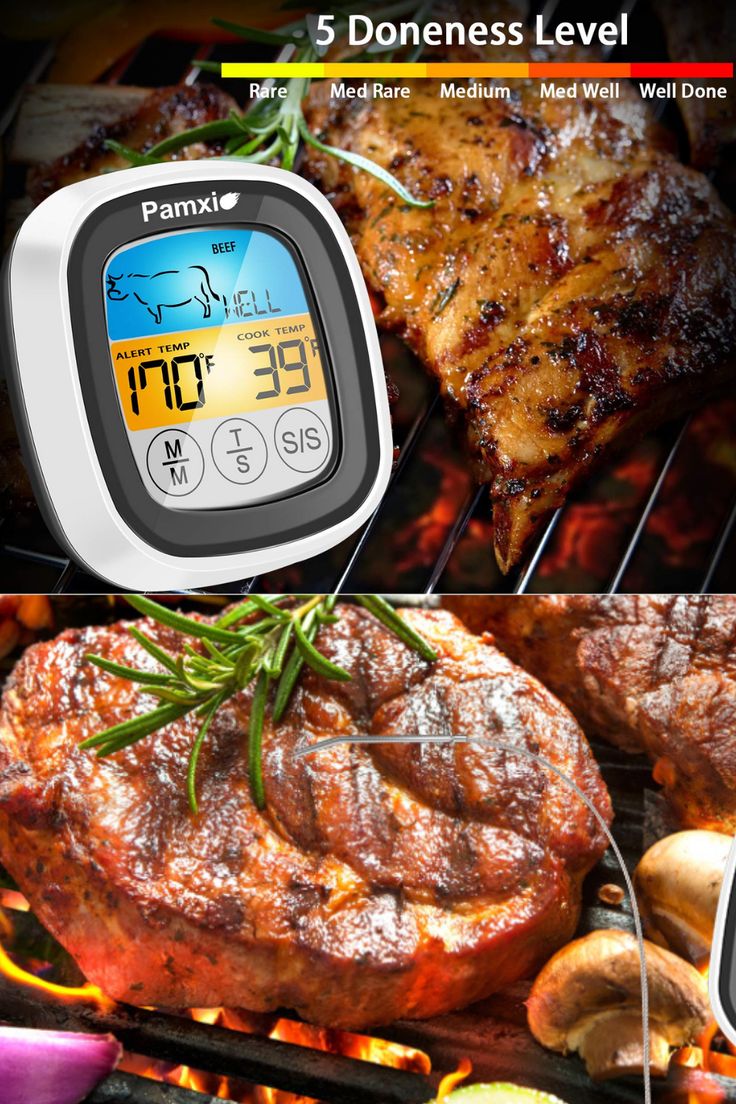 thermometers are on top of some meat and vegetables in front of an open grill