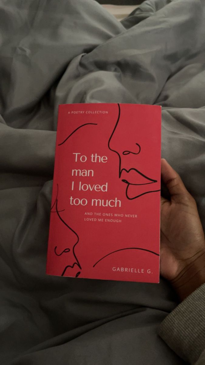 a person laying in bed with a book about to the man i loved too much