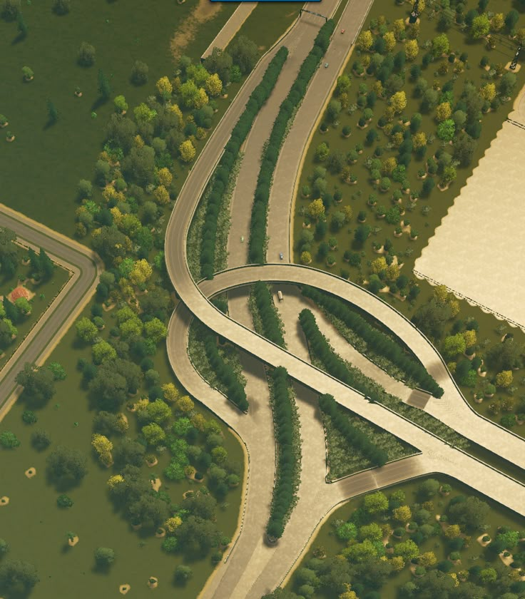 an aerial view of a road intersection with multiple lanes