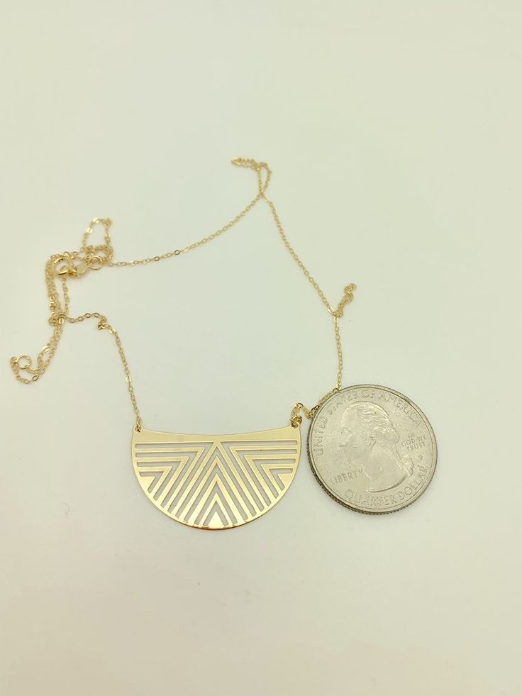 "14k Solid Yellow Gold Crescent Tribal Aztec Necklace Material: 14K Solid Gold (DS7060P241) Length: 18\" Adjustable to 16\" Lobster Clasp Weight: Approx 1.4g Please note that all of my items are 100% genuine 14k solid gold. Please be confident, none are plated or filled they are solid 14k gold. Comes in gift box! If you have any questions, please feel free to ask. I am more than happy to help in every way. Let's Stay Connected FOLLOW ME ON INSTAGRAM @THEHONESTJEWELER FOR SPECIAL DEALS AND GIVEAW Adjustable 14k Gold Bohemian Jewelry, Adjustable Bohemian 14k Gold Jewelry, Handmade 14k Gold Bohemian Jewelry, Bohemian Yellow Gold Metal Necklace, Gold Geometric Brass Jewelry, Bohemian Geometric Gold Jewelry, Handmade Geometric Gold Jewelry, Minimalist Gold Etched Necklaces, Minimalist Etched Gold Necklaces