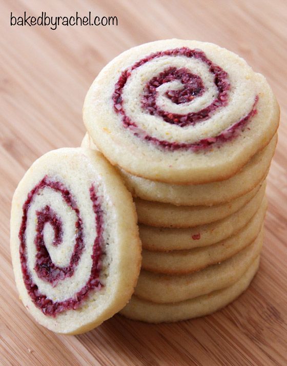 a stack of cookies sitting on top of a wooden table