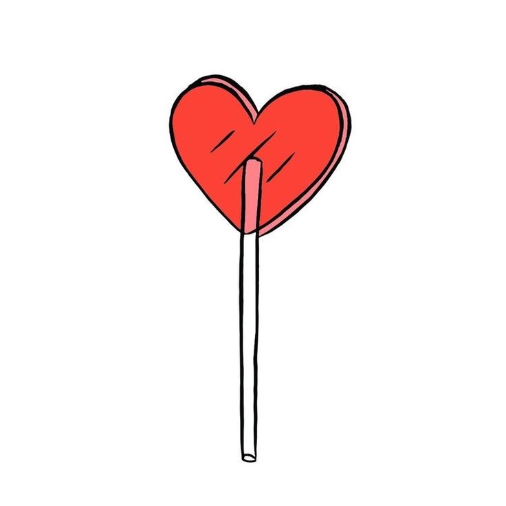 a heart shaped lollipop with a stick sticking out of it's side