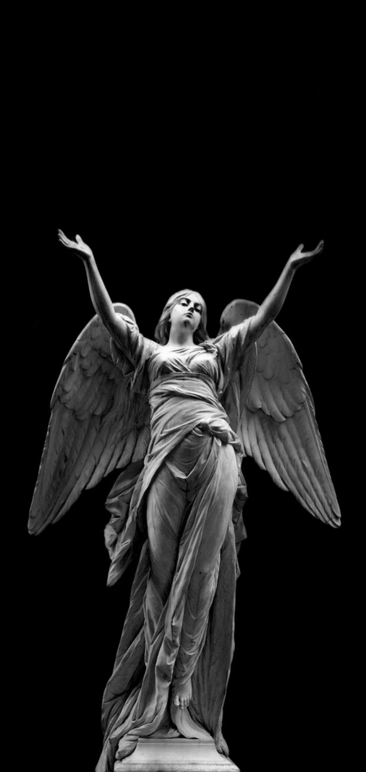 an angel statue is shown in black and white with the text, 13 + photoshopped