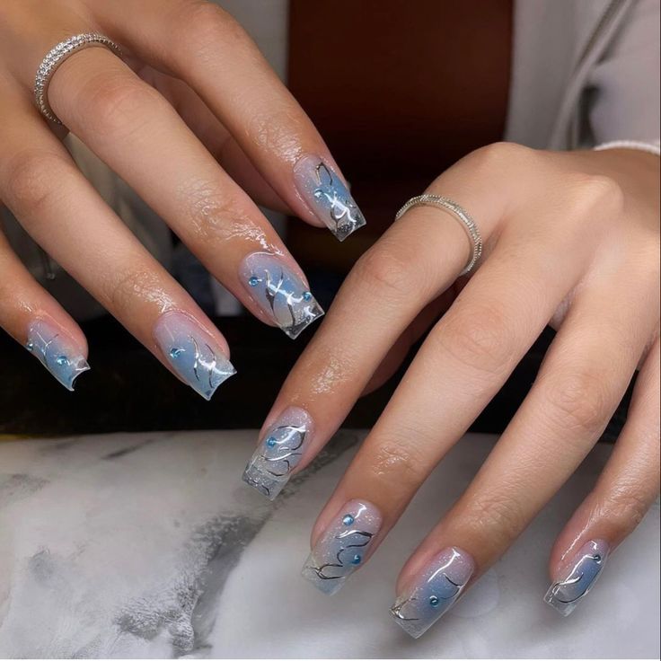 Silver Light Blue Nails, Light Blue Sparkly Nail Designs, Light Blue And Sparkle Nails, Smokey Blue Nails Prom, Light Sparkly Blue Nails, Blue And Sliver Nails Ideas, Light Blue Nail Ideas Short, Light Blue Silver Nails, Light Blue Nails With Silver