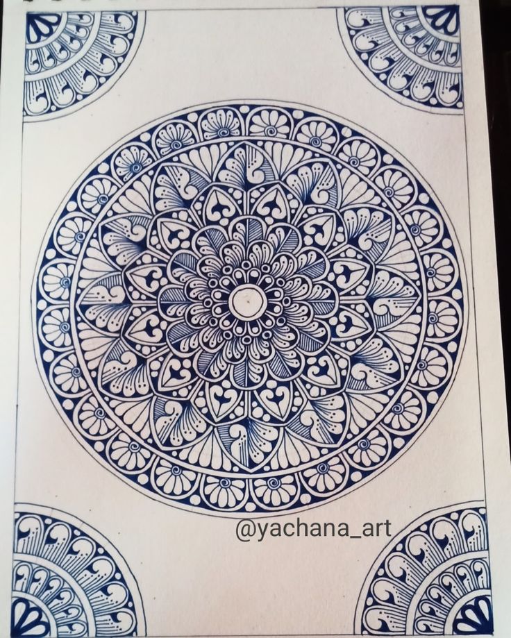 an intricate blue and white design on a piece of paper with the words yachana art written below it