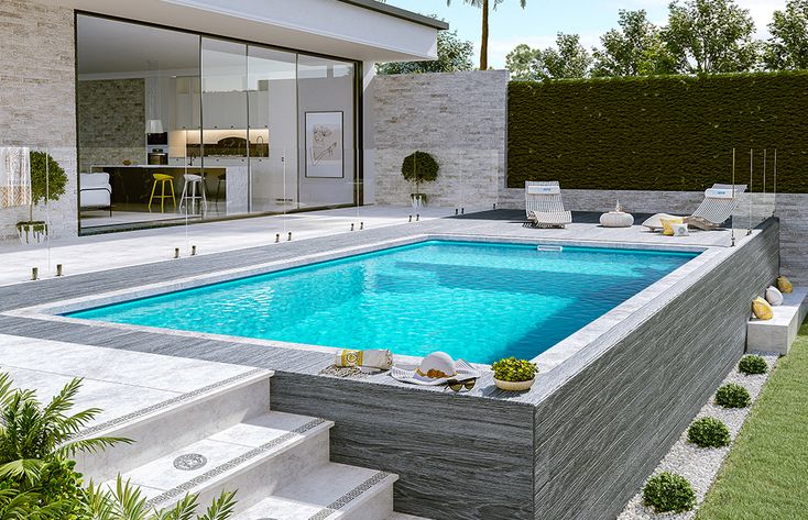 an outdoor swimming pool with steps leading up to it and lounge chairs around the pool