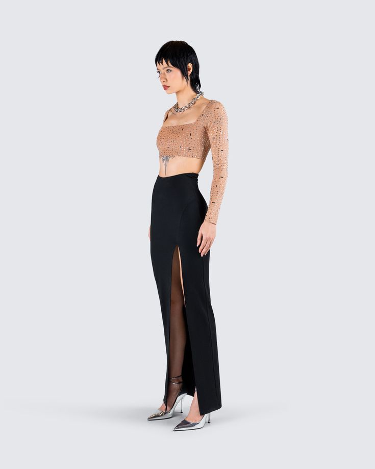 It’s no secret that you’ll be the best dressed in this fit 😚 Featuring a nude rhinestone cropped top paired with a black knit skirt for a subtle, yet chic look that will have them all following your every move 🖤 Glamorous Stretch Crop Top For Evening, Chic Evening Crop Top, Glamorous Evening Crop Top, Elegant Cropped Top For Party, Elegant Cropped Crop Top For Party, Elegant Party Crop Top Camisole, Elegant Long Sleeve Crop Top For Night Out, Embellished Long Sleeve Crop Top For Evening, Elegant Fitted Embellished Crop Top