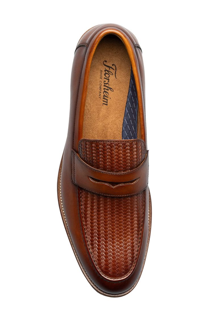 Mixed textures and a classic penny keeper lend visual intrigue to a sophisticated leather loafer set on a cushioned footbed and flexible rubber sole. Cushioned footbed Leather upper/textile lining/rubber sole Imported Formal Brown Slip-ons With Cushioned Footbed, Formal Brown Moccasins With Textured Sole, Brown Formal Leather Shoes With Cushioned Footbed, Formal Brown Leather Shoes With Cushioned Footbed, Brown Cushioned Loafers For Business Casual, Business Loafers With Textured Sole In Brown, Brown Business Loafers With Textured Sole, Brown Business Moccasins With Cushioned Footbed, Brown Cushioned Moccasins For Business