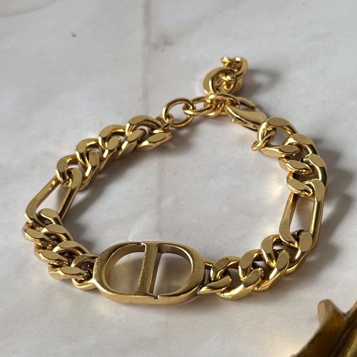 Length: 6" with a 1.5" extension chain attached Material: Stainless Steel Plating: 18k Real Gold Lobster claw clasp closure Bracelet is 100% nickel-free and cadmium-free Bracelet is hypoallergenic and tarnish resistant Free Bracelet, Real Gold, Lobster Claw, Plating, Thing 1, Stainless Steel, Bracelet, Chain, Gold