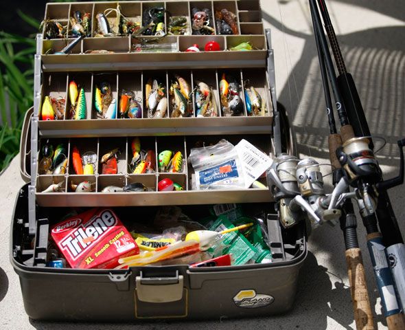 a fishing tackle box filled with lots of different items