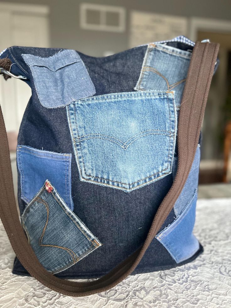 Denim Purse Blue Recycled Denim Jeans With Side Pockets, Blue Jeans With Pockets For Everyday, Blue Cotton Jeans For Everyday Use, Spring Denim Jeans For Everyday Use, Fall Denim Jeans For Everyday Use, Casual Upcycled Blue Jeans, Casual Cotton Jeans For Everyday, Casual Medium Wash Upcycled Jeans, Upcycled Medium Wash Denim Jeans