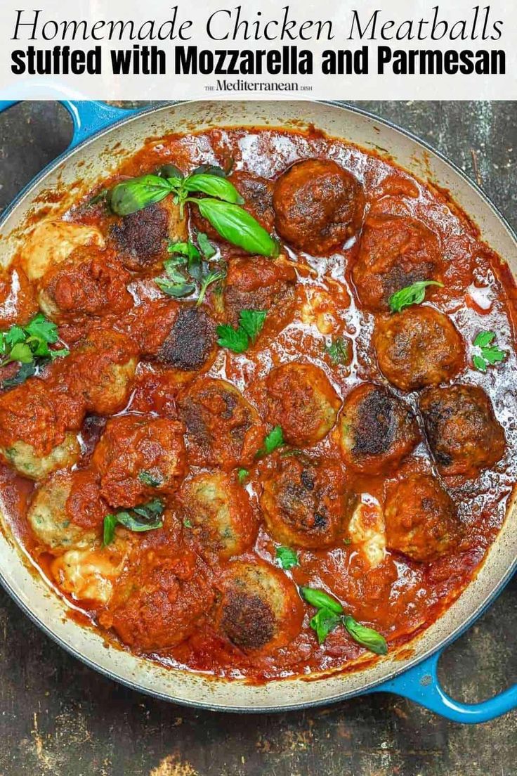 homemade chicken meatballs stuffed with mozzarella and parmesan in a blue pan