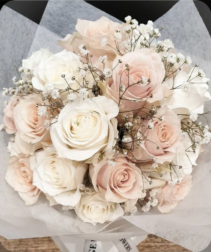 a bouquet of flowers sitting on top of a table