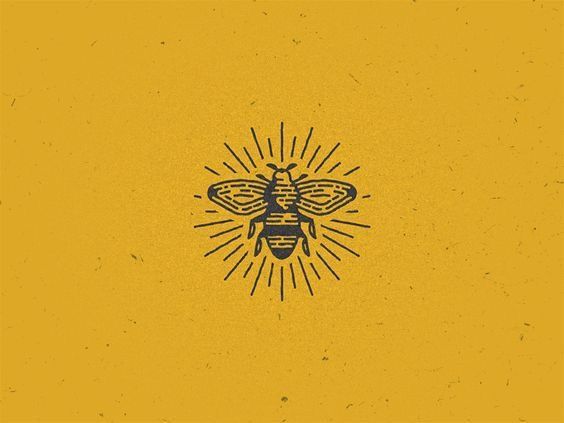 a bee with sunburst in the background