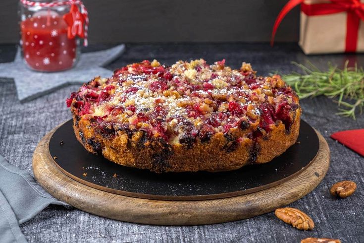 a cake sitting on top of a black plate