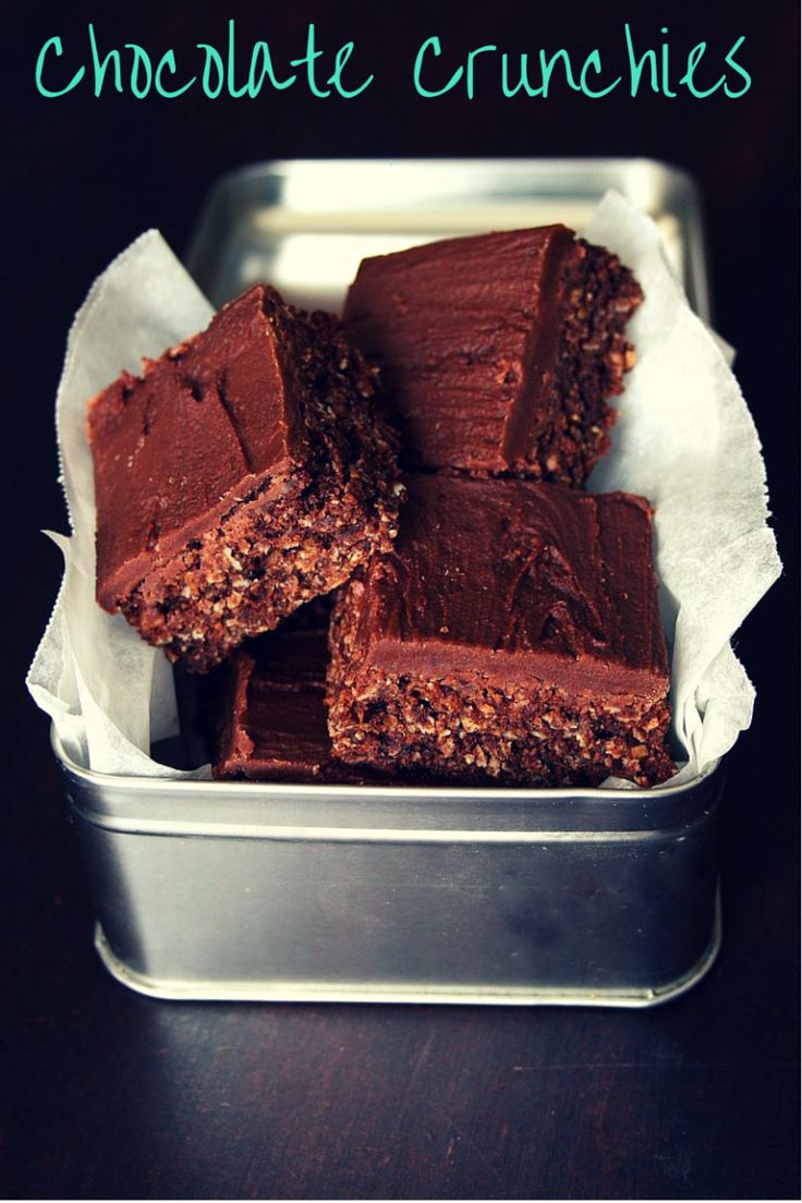 chocolate crunchies in a tin on a table with the words, chocolate crunchies