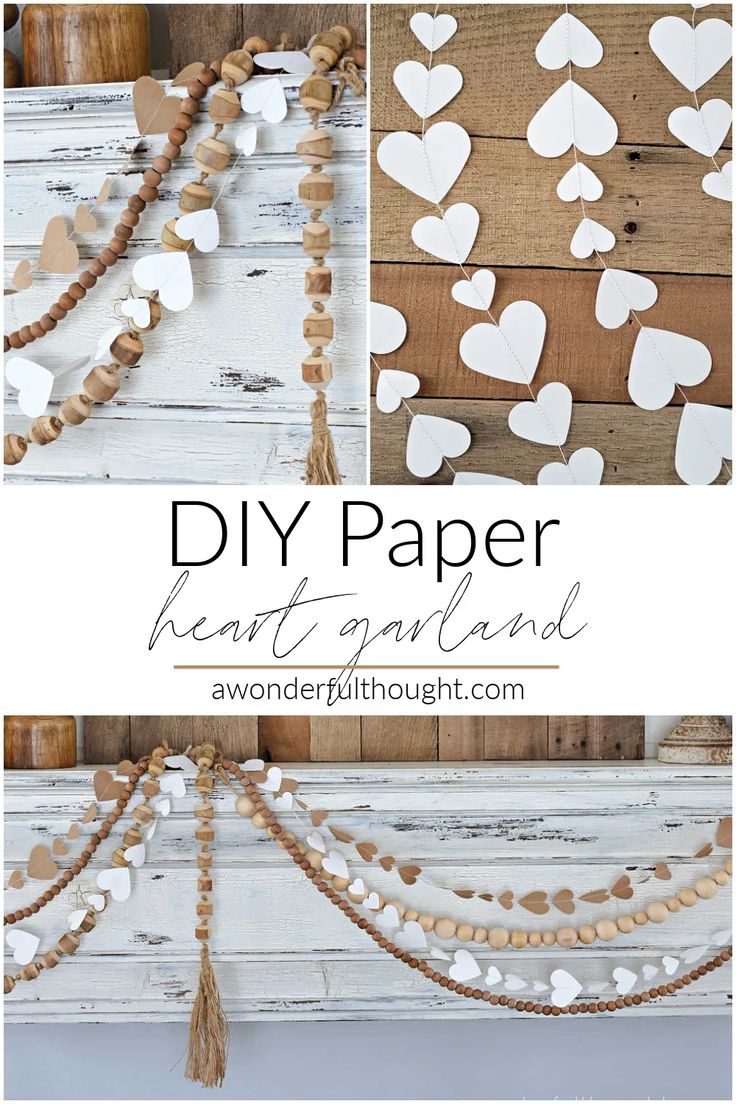 the diy paper heart garland is made with white hearts and tassels