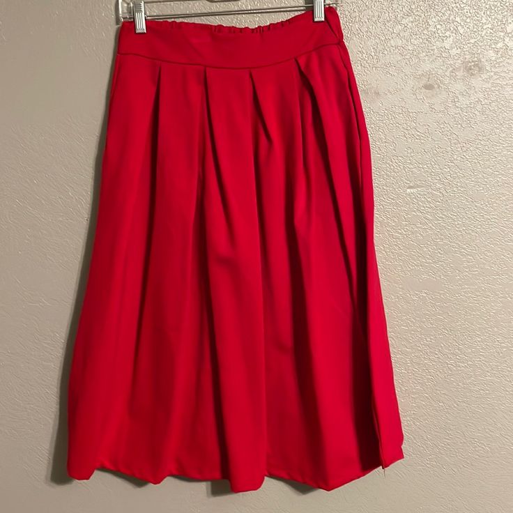 Brigitte Brianna (Sexy Modest Boutique Online), Pleated Knee Length Skirt With Pockets Stretch High Waist Pleated Party Skirt, High Waist Stretch Pleated Party Skirt, High Waist Stretch Pleated Skirt For Party, Red Knee-length Mini Skirt, Red Midi Skirt For Night Out, Red Knee-length Bottoms For Night Out, Red Long Skirt For Night Out, Non-stretch Red Mini Skirt, Red Non-stretch Mini Skirt