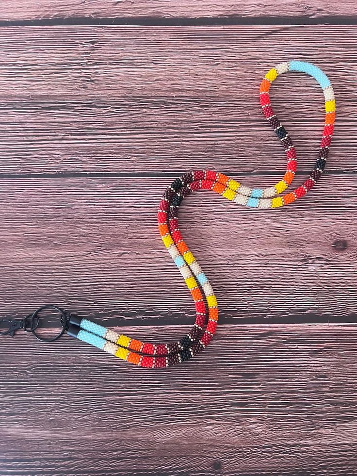 Beaded Lanyard - Etsy Adjustable Beaded Chain Necklace For Everyday, Handmade Beaded Necklace With Round Beads, Adjustable Round Beaded Necklaces For Everyday, Artisan Adjustable Beaded Chain, Handmade Beaded Necklaces With Round Beads For Everyday, Everyday Beaded Necklaces With Round Beads, Multicolor Beaded Necklaces With Round Beads For Everyday, Multicolor Round Beaded Necklaces For Everyday, Bohemian Handmade Lanyards As Gifts