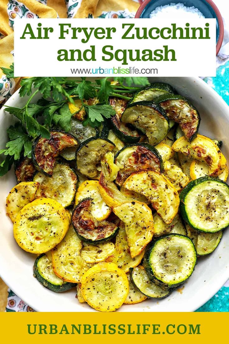 an image of air fryer zucchini and squash in a bowl with parsley