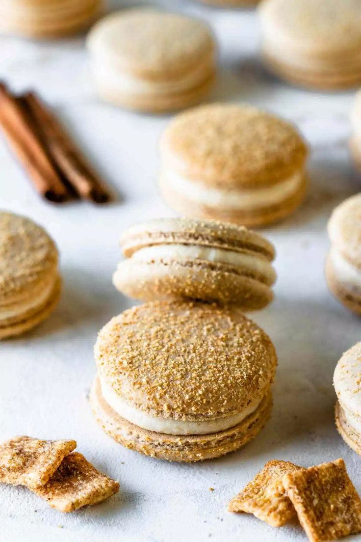 cinnamon toast crunch macarons are stacked on top of each other