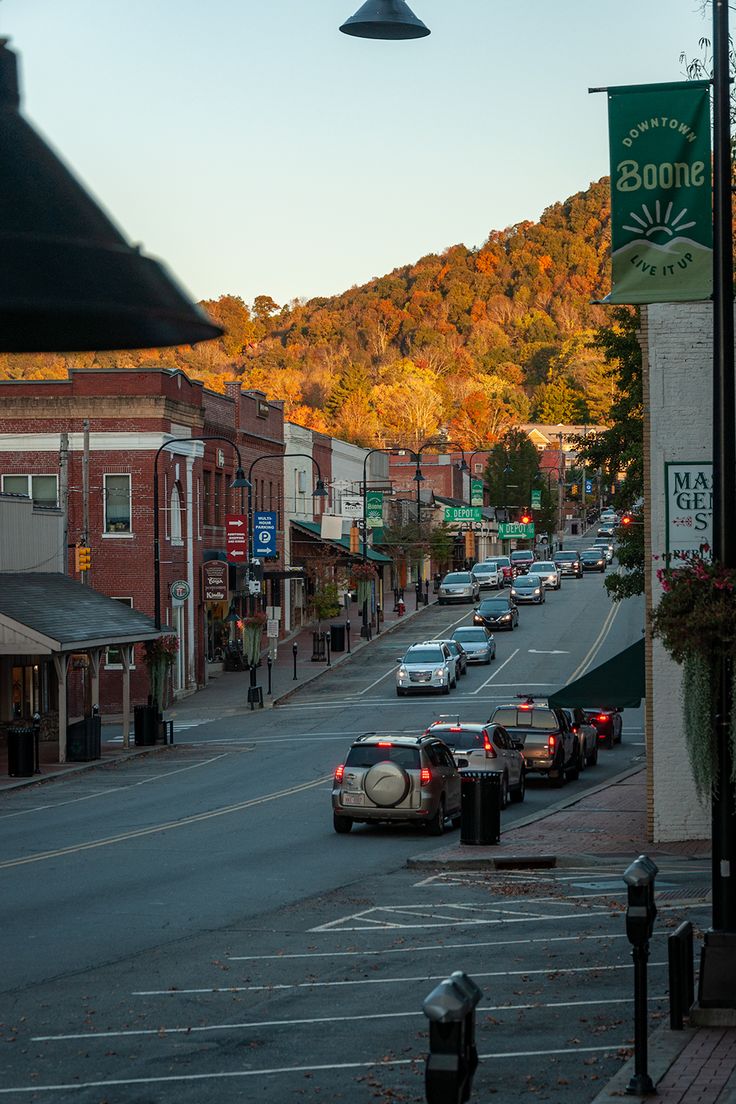 cars are parked on the side of an empty street