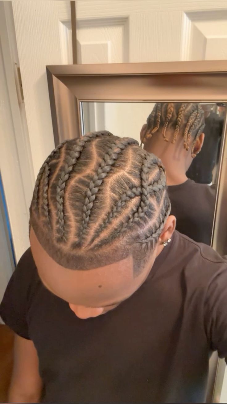 NOT MY PIC, DM FOR CREDIT/REMOVAL. Explore the trendy men's cornrow hairstyles. From simple short fades to intricate braided designs, discover a variety of cornrow ideas for men. Whether you prefer natural cornrow styles or all-black cornrows, find inspiration for long hairstyles and braids designed specifically for men. Elevate your look with these stylish and masculine cornrow hairstyles. #cornrowhairstyles #menbraids #longhairstylesformen #braidedcornrows #mencornrowdesigns #menshairstyles Hairstyle For Men Braids, Braid Styles For Medium Length Hair, Man Hairstyle Braids, Male Braid Designs, 2strands Twist Men, Crome Heart Braids, 4 Men’s Braids, Men’s Stitch Braids With Design, Cornbraids Hairstyles Men