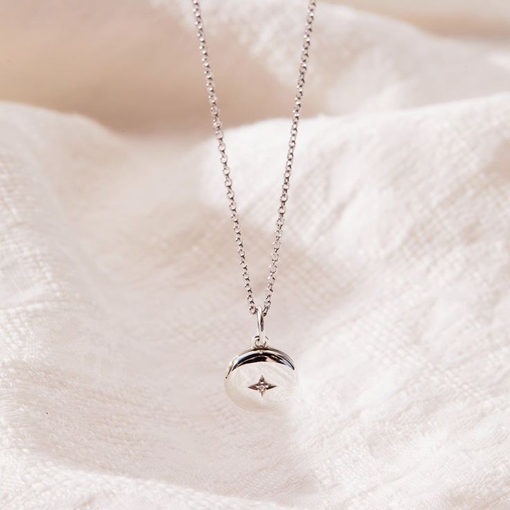 Our new Round Mini Locket Necklace is a dainty way to celebrate the love in your life! This tiny but meaningful necklace opens with space inside for two initials - perfect for you and your partner as a reminder that it all started with you falling in love. Or, engrave any two initials that are special to you! available in gold vermeil, sterling silver and 14k yellow gold locket can be engraved inside with one initial per side (uppercase only) hangs on adjustable cable chain locket measures 10mm in diameter gold vermeil and sterling silver lockets have a cubic zirconia stone in the front center Dainty Pendant Charm Necklace For Anniversary Gift, Minimalist Initial Pendant Charm Necklace For Anniversary Gift, Minimalist Initial Pendant Charm Necklace For Anniversary, Minimalist Initial Pendant Necklace For Anniversary, Minimalist Initial Necklace For Anniversary, Minimalist Pendant Charm Necklace For Anniversary, Dainty Initial Pendant Necklace For Anniversary, Dainty Sterling Silver Initial Necklace For Anniversary, Minimalist Charm Necklace For Anniversary