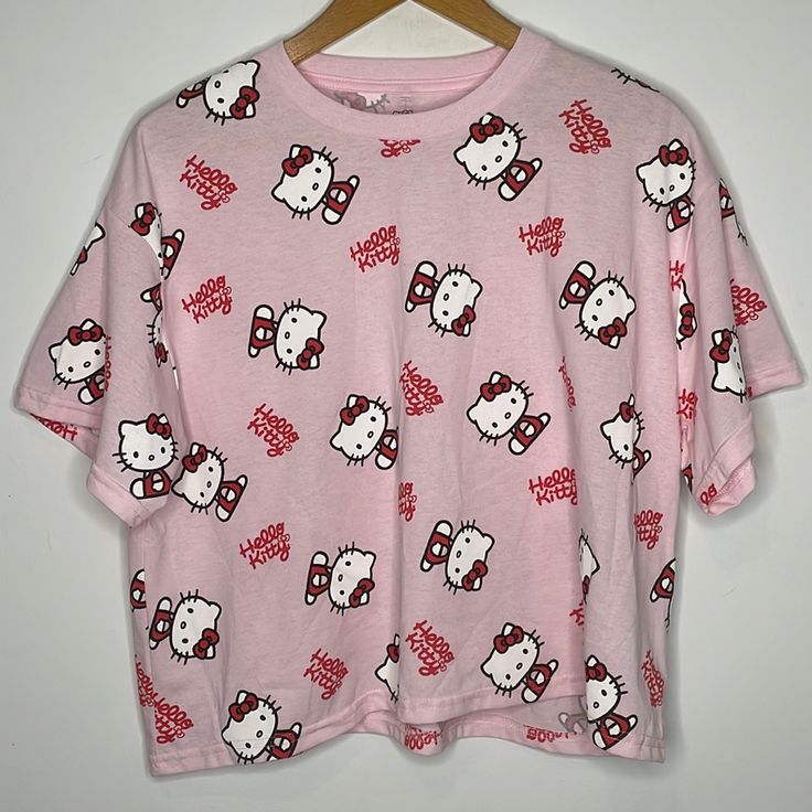 New Without Tags, Still Has The Plastic Thing From The Tag Hello Kitty By Sanrio Size Xl Short Sleeve Crewneck T-Shirt Light Pink With Hello Kitty Print And In Cursive All Over 50% Cotton 50% Polyester Playful Hello Kitty Tops For Spring, Spring Hello Kitty Playful Tops, Playful Red Tops For Loungewear, Printed Short Sleeve Tops For Loungewear, Pink Hello Kitty Cotton Top, Red Graphic Print Tops For Loungewear, Cute Hello Kitty Print Tops For Spring, Hello Kitty Y2k Summer Top, Pink Short Sleeve Top With Hello Kitty Print