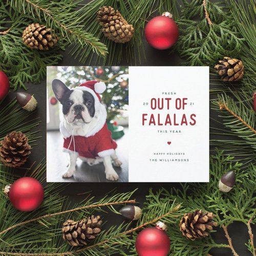 a christmas card with an image of a dog wearing a santa hat and red sweater