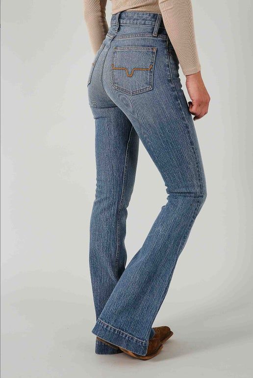 Kimes Ranch Jennifer Mid Wash High Rise Stretch Trouser Jeans - Upgrade your wardrobe with Kimes Ranch Womens Jennifer Medium Wash High Rise Stretch Trouser Jeans. These jeans are made of 99% cotton and 1% elastane, making them comfortable and stretchy. The medium wash and high rise style give them a classic look, while the super wide flare leg with finished hems adds a trendy touch. The jeans feature signature embroidery on the back pockets, whiskering, and hand sanding details. They are easy t Hoco Outfit Ideas, Cowgirl Essentials, Outfit Ideas With Jeans, Kimes Ranch Jeans, Kimes Ranch, Farm Clothes, Western Wear Outfits, Cute Country Outfits, Western Clothing