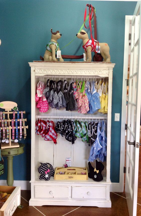 a toy horse is sitting on top of a shelf in a room with blue walls