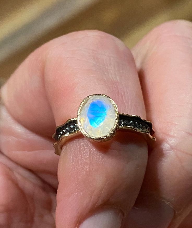 Elegant, vintage, handcrafted, genuine rainbow moonstone rings, 18k gold plated 925 sterling silver. Surface size: 9*7 mm. Band width: 3 mm. Stone weight: 1 grams. Sizes: 6, 7, & 8. Yellow Gold Moonstone Ring With Ethiopian Opal, Unique Yellow Gold Moonstone Ring, Unique Oval Yellow Gold Moonstone Ring, Unique Yellow Gold Oval Moonstone Ring, Unique Oval Moonstone Ring In Yellow Gold, Handmade 14k Gold Oval Moonstone Ring, Hallmarked Yellow Gold Moonstone Ring, Handmade Oval Moonstone Ring In 14k Gold, Yellow Gold Moonstone Ring With Ethiopian Opal For Gift