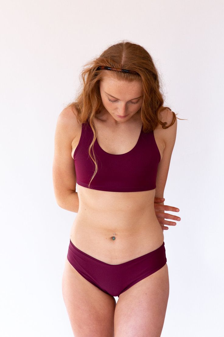 Saturday Swimwear's classic Isla Top is sporty yet fashionable and is designed to provide serious comfort and support throughout all of life’s adventures. These sustainable swimsuits are handmade using 78% regenerated nylon and 22% XTRA Life Lycra®. Please note that tops do not have padding. Stretch Swimwear With Built-in Cups For Workout, Nylon Swimwear With Built-in Bra For Training, Functional Seamless Stretch Swimwear, Stretch Swimwear With Built-in Padding For Training, Compressive Athleisure Swimwear With Built-in Bra, Sporty Full Coverage Swimwear With Seamless Construction, Sporty Swimwear With Built-in Bra And High Stretch, Functional High Stretch Solid Swimwear, High Stretch Functional Solid Swimwear