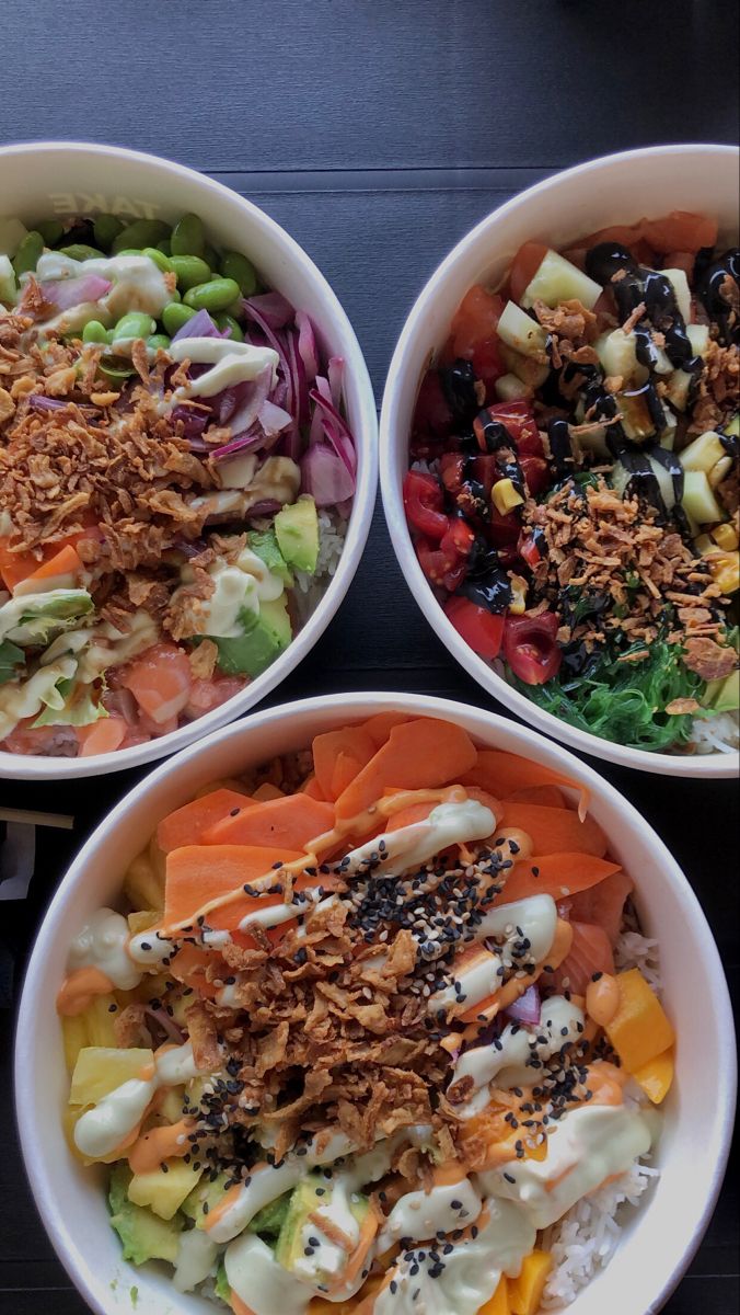 three bowls filled with different types of food