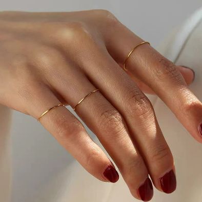 This ultra thin stacking ring by is made of 18K gold and rose gold plating for a timeless minimalist look. The minimalist design adds a delicate touch to any outfit, while the midi gold ring is suitable for both indoor and outdoor occasions. [MATERIAL]: Yellow brass with real 18k gold plated. Our ring will not tarnish or turn green. Clean Sterling Silver, Chic Rings, Minimal Ring, Layered Rings, Gold Rings Stackable, Ringe Gold, Gold Filled Ring, Gold Ring Stack, Gold Band Ring