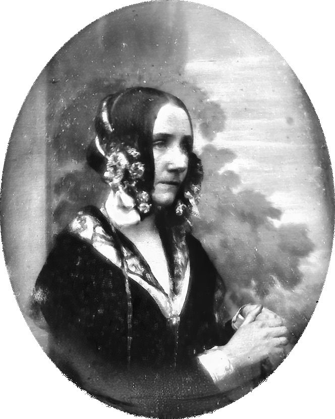 an old black and white photo of a woman