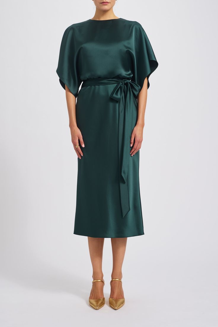 Fluid satin dolman sleeve bias midi dress. Shown in Hunter. Formal Green Silk Midi Dress, Silk Maxi Dress With Draped Sleeves For Dinner, Elegant Viscose Midi Dress With Draped Sleeves, Chic Satin Midi Dress With Draped Sleeves, Formal Dress With Draped Kimono Sleeves, Silk Midi Dress With Kimono Sleeves, Elegant Formal Dresses With Kimono Sleeves, Spring Evening Midi Dress With Kimono Sleeves, Elegant Green Dress With Kimono Sleeves