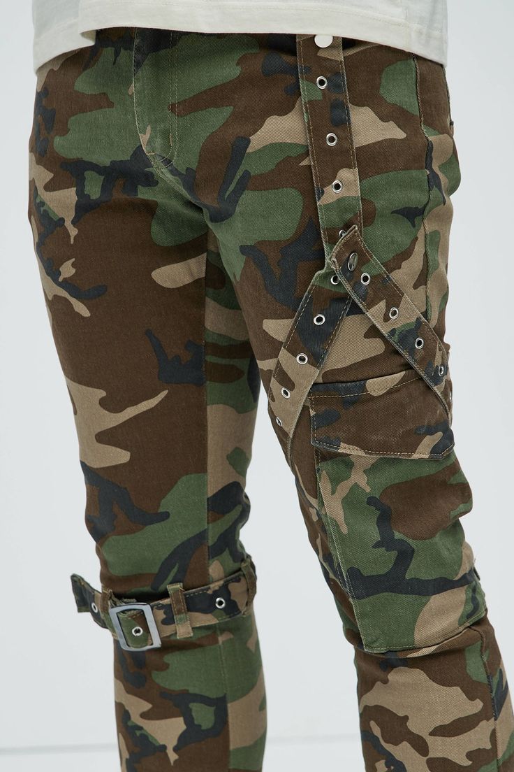 Available In Camouflage. Stacked Skinny Flared Fit Zip Fly Button Closure 5 Pocket Detail Straps Detail 85% Cotton, 13% Polyester, 2% Spandex Imported | Mens With The Straps Camo Stacked Skinny Flare Pants in Camouflage size 38 by Fashion Nova High Waist Camouflage Military Bottoms, Fitted Camouflage Military Pants, Military Camouflage Bottoms With Belt Loops, Camouflage Utility Pants With Belt Loops, Military Style Camouflage Cargo Pants, Camouflage Fashion, Search By Photo, Jean Top, Pocket Detail