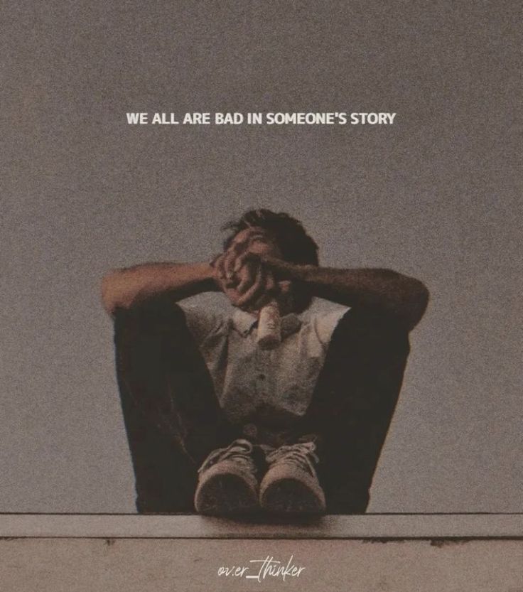 a man sitting in a chair with his hands on his face and the words we all are bad in someone's story