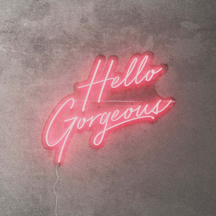 a neon sign that says hello gorgeous