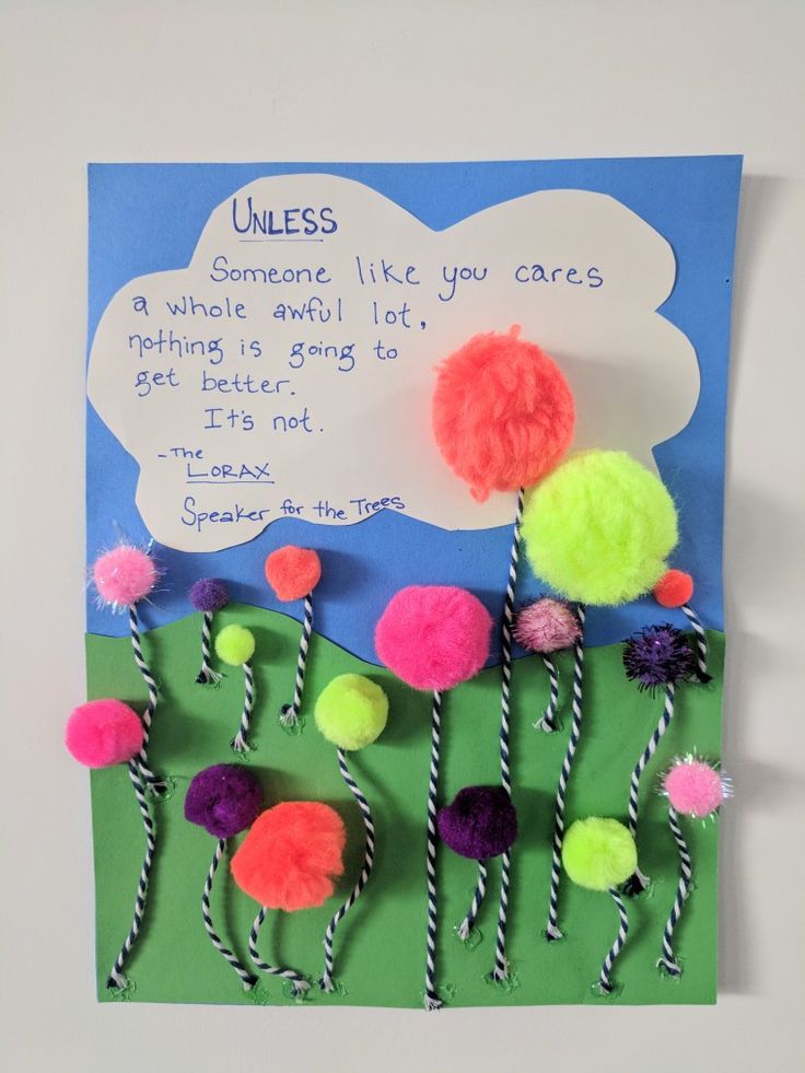 a card with pom poms on it that says unless