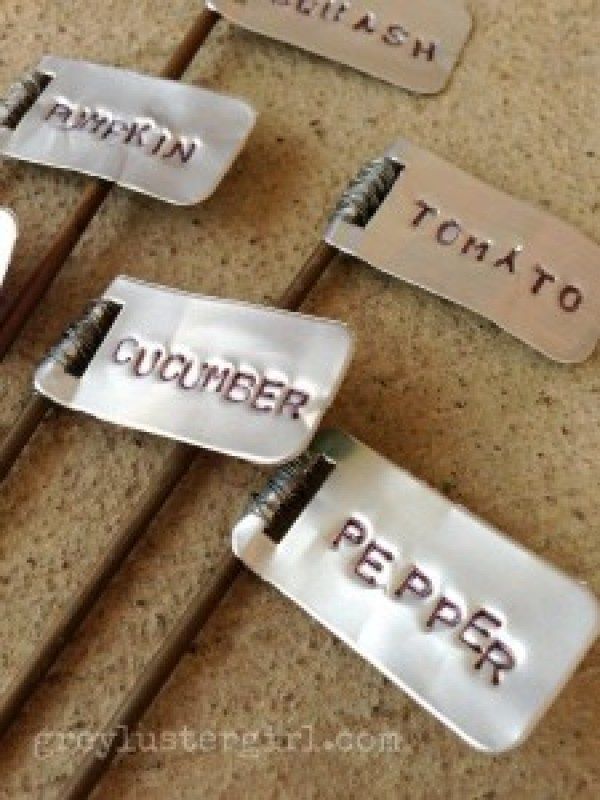 several different types of metal tags with words on them that spell out the name of each type